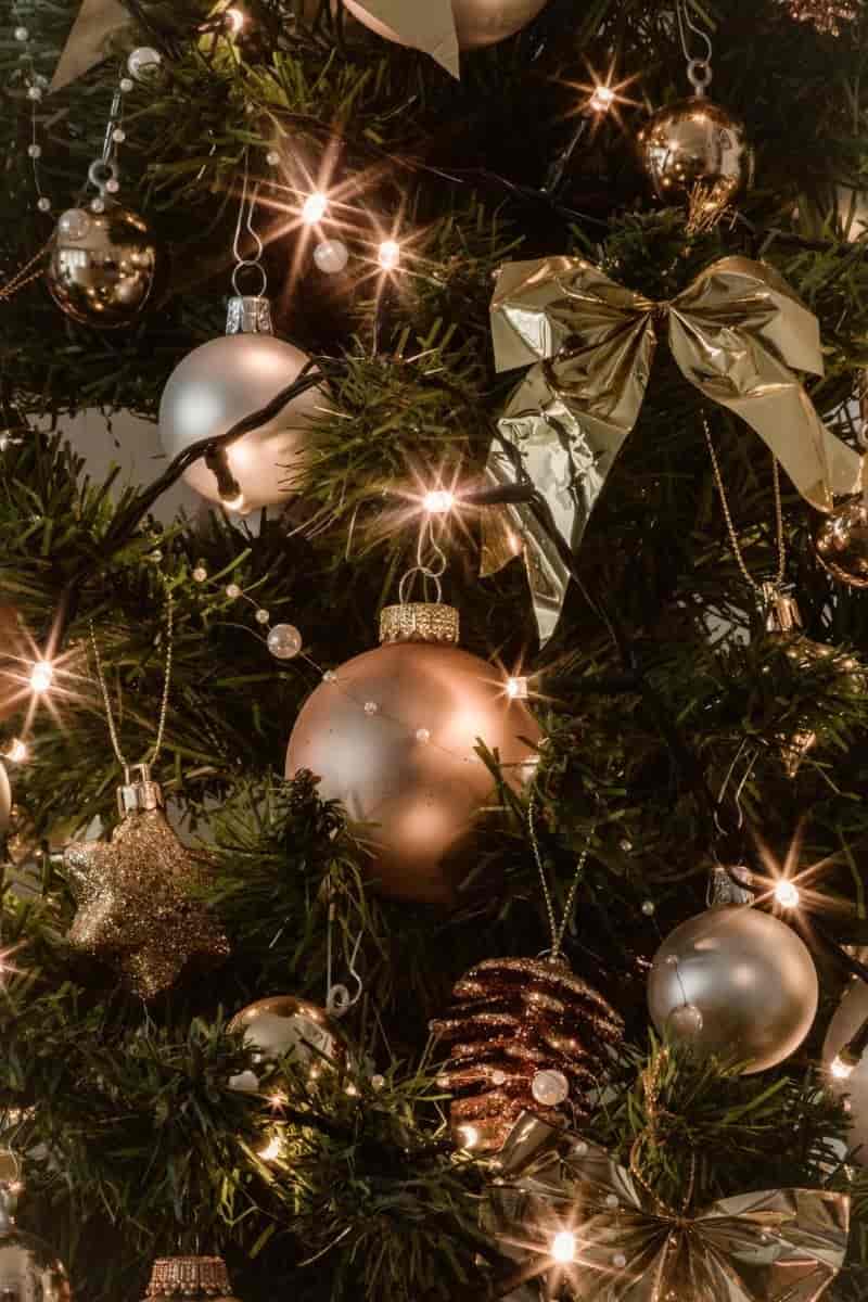 Gray and Gold Bubles hanged on Christmas Tree